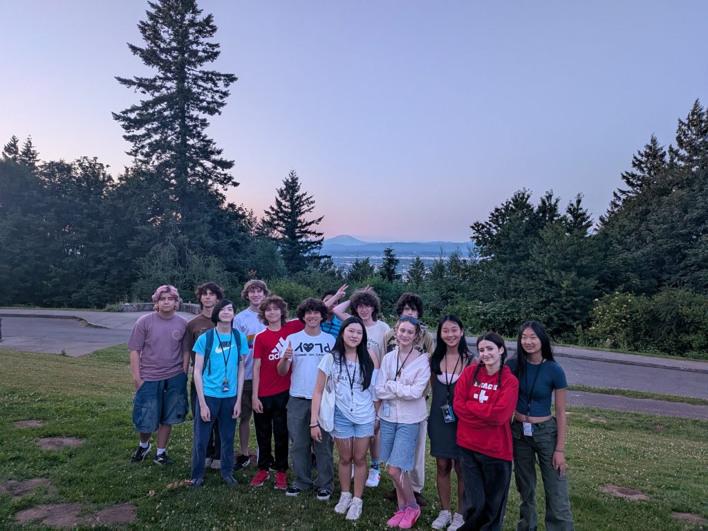 Lewis & Clark camp group gathered at an overlook at dusk